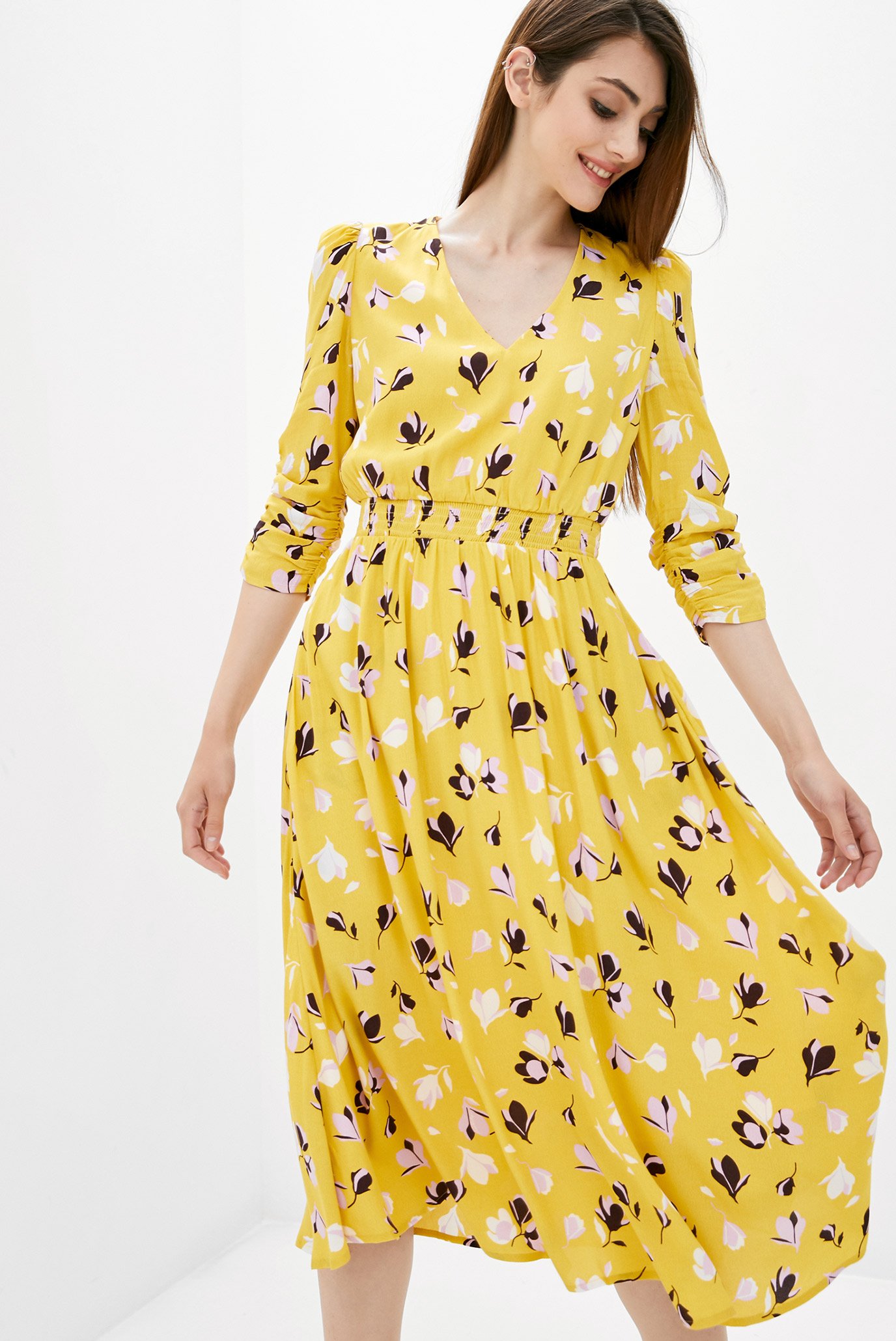 Жіноча жовта сукня з візерунком 1