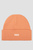 Женская персиковая шапка
