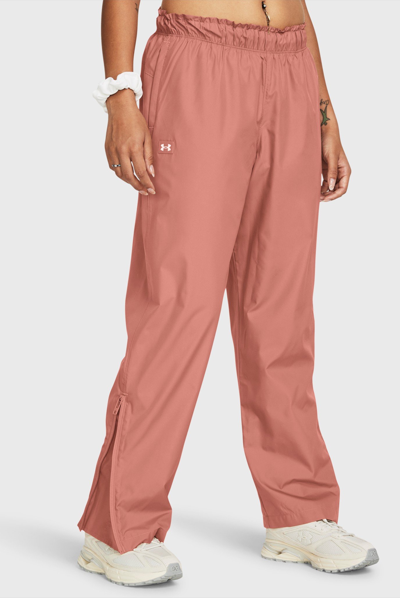 Женские розовые спортивные брюки UA Rush OS Woven Pant 1