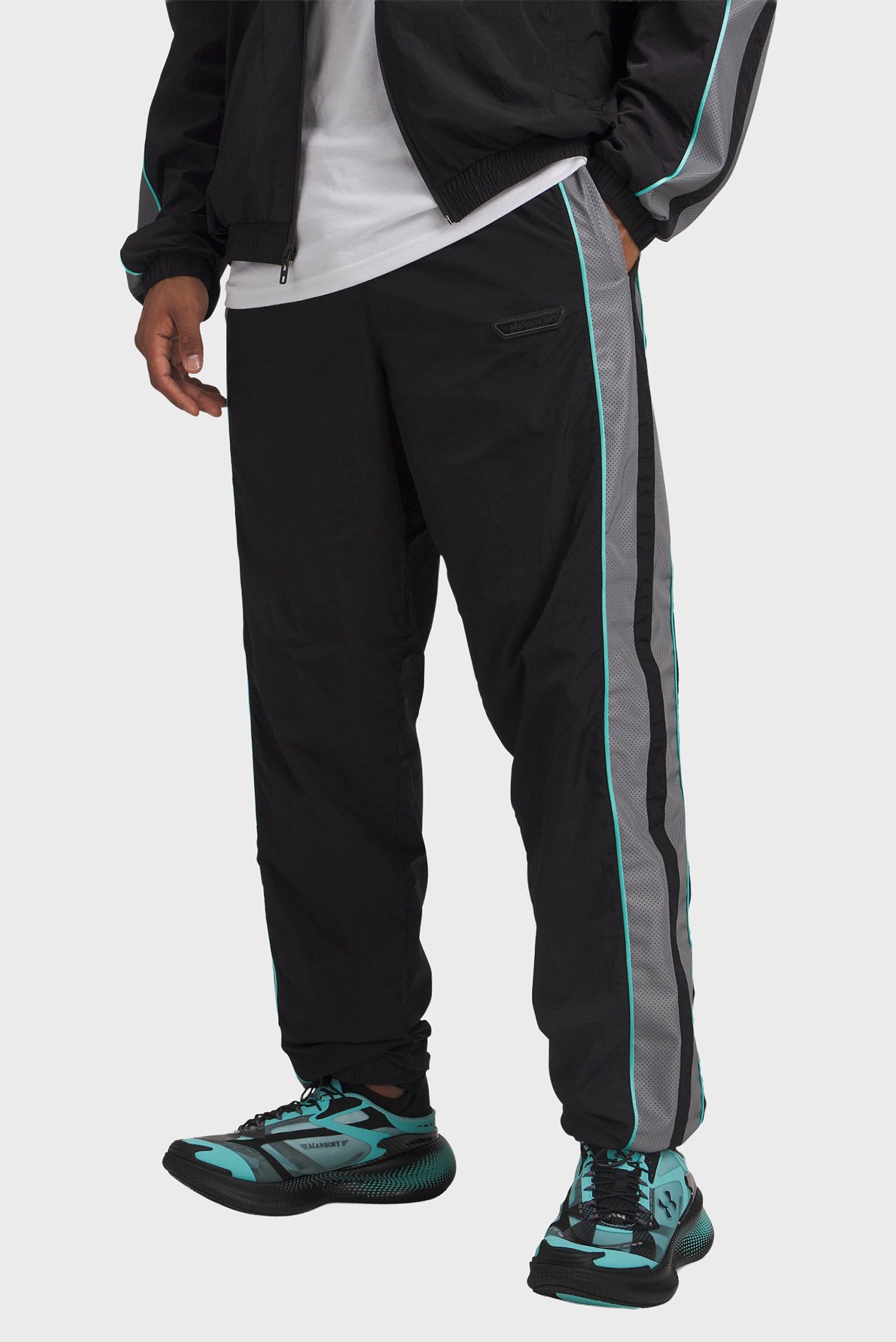 Мужские черные спортивные брюки UA x Mansory Icon Trk Pant Черный M Under Armour 6009099-002 Мужские черные спортивные брюки UA x Mansory Icon Trk Pant Черный M Under Armour 6009099-002