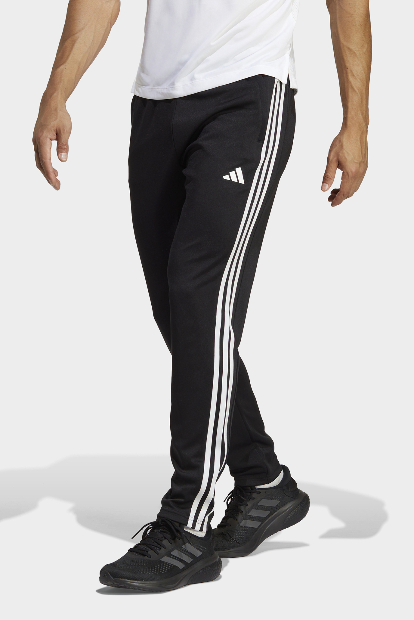 Чоловічі чорні спортивні штани Train Essentials 3-Stripes 1