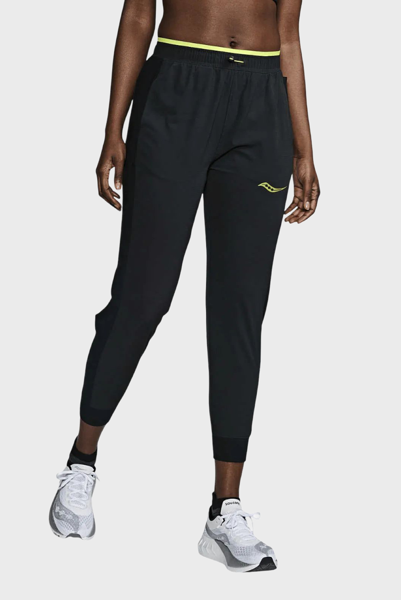 Женские черные спортивные брюки ELITE Черный M Saucony SAW800511-BKES5 Женские черные спортивные брюки ELITE Черный M Saucony SAW800511-BKES5
