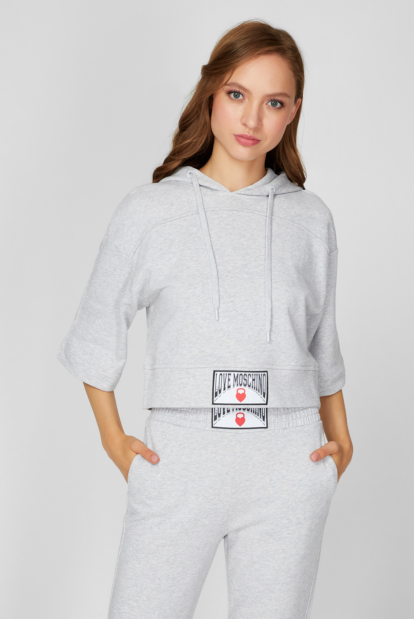 Женское серое худи Серый 38 Love Moschino W641880M4055 Женское серое худи Серый 38 Love Moschino W641880M4055