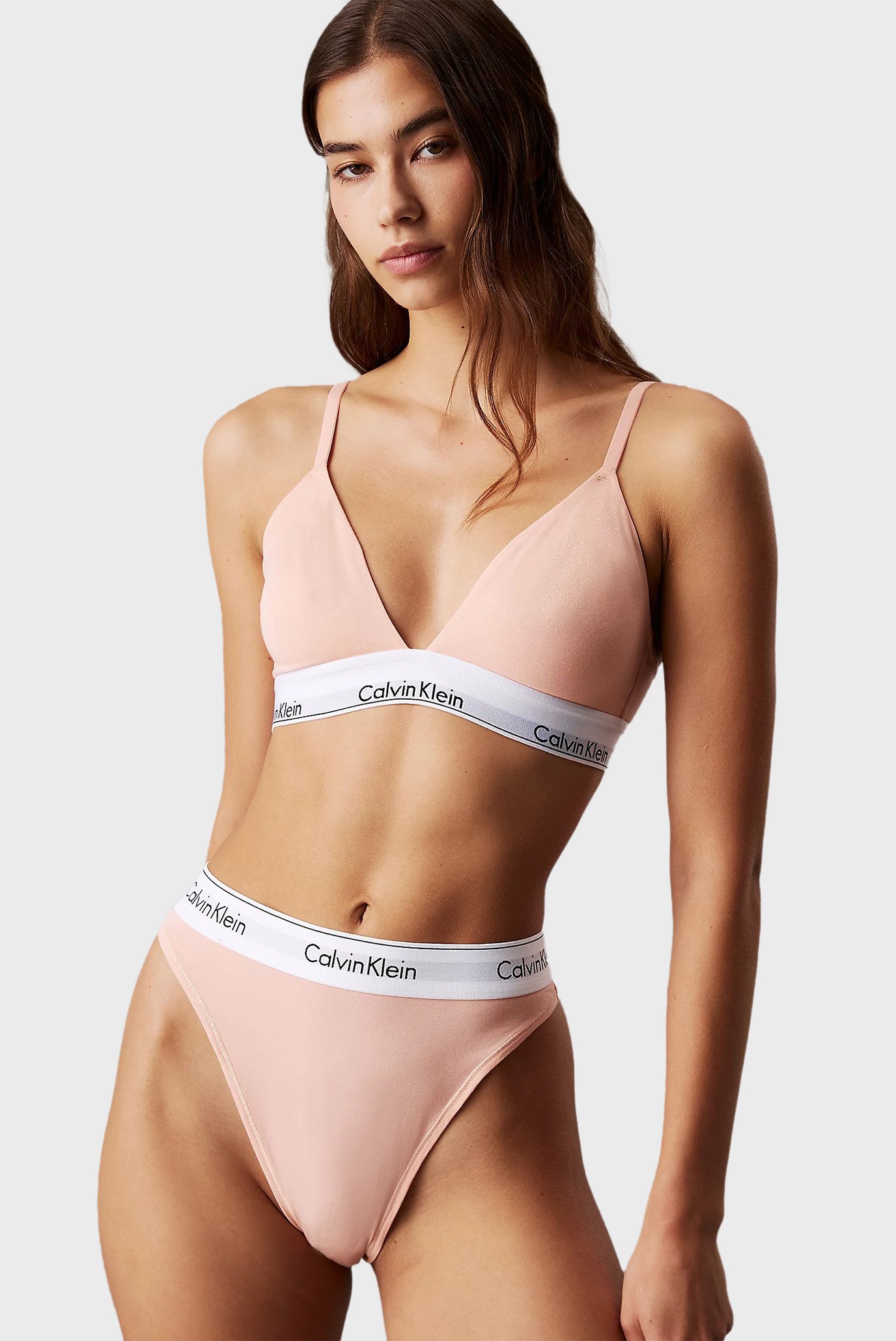 Женские персиковые трусики HIGH LEG TANGA Розовый S Calvin Klein LV00QF8319 Женские персиковые трусики HIGH LEG TANGA Розовый S Calvin Klein LV00QF8319