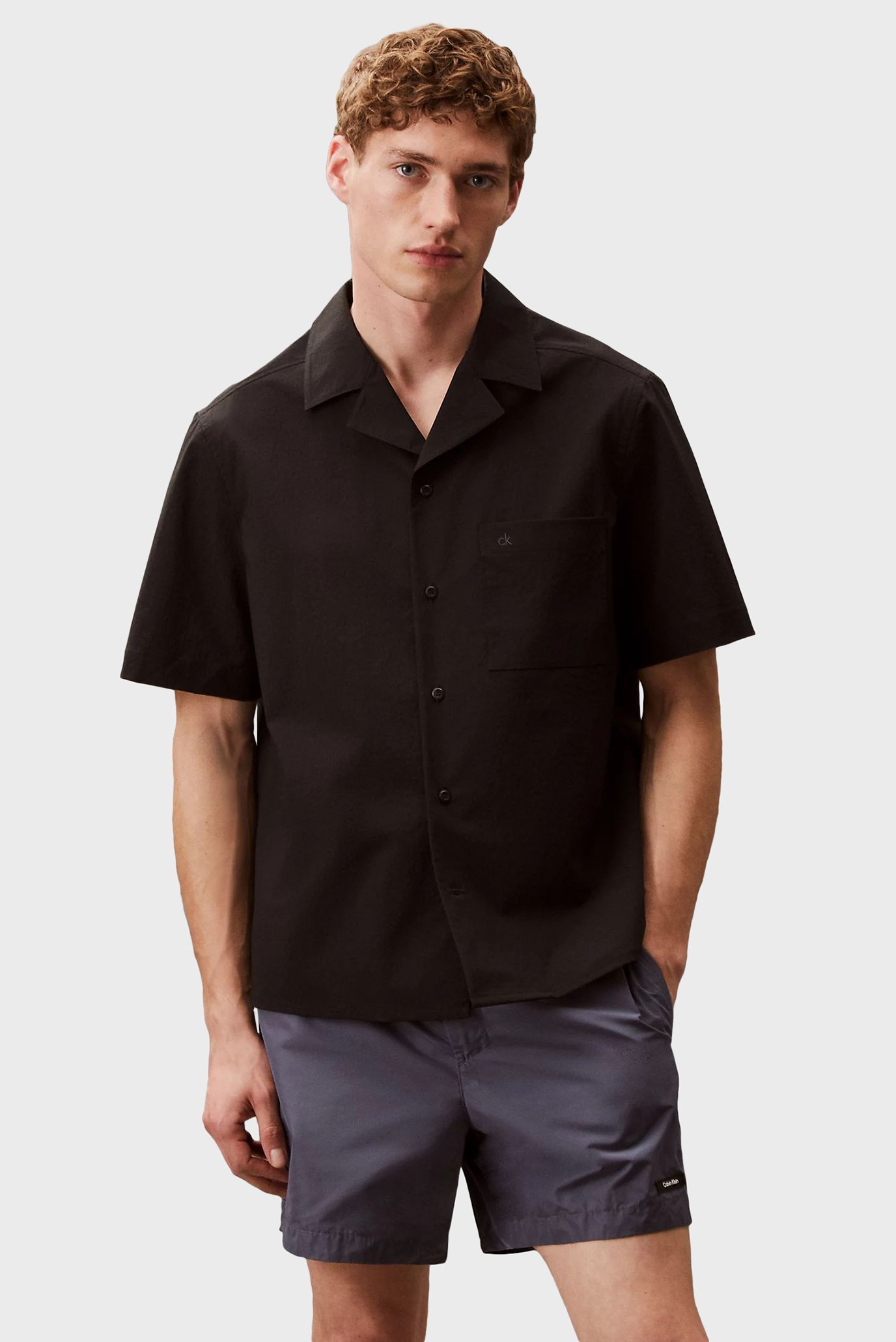 Мужская черная рубашка SS SHIRT Черный L Calvin Klein KM0KM01151 Мужская черная рубашка SS SHIRT Черный L Calvin Klein KM0KM01151