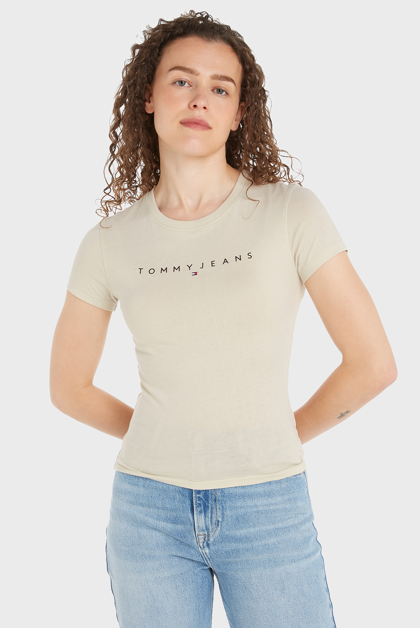 Женская бежевая футболка TJW SLIM LINEAR TEE EXT Бежевый XS Tommy Jeans DW0DW18398 Женская бежевая футболка TJW SLIM LINEAR TEE EXT Бежевый XS Tommy Jeans DW0DW18398