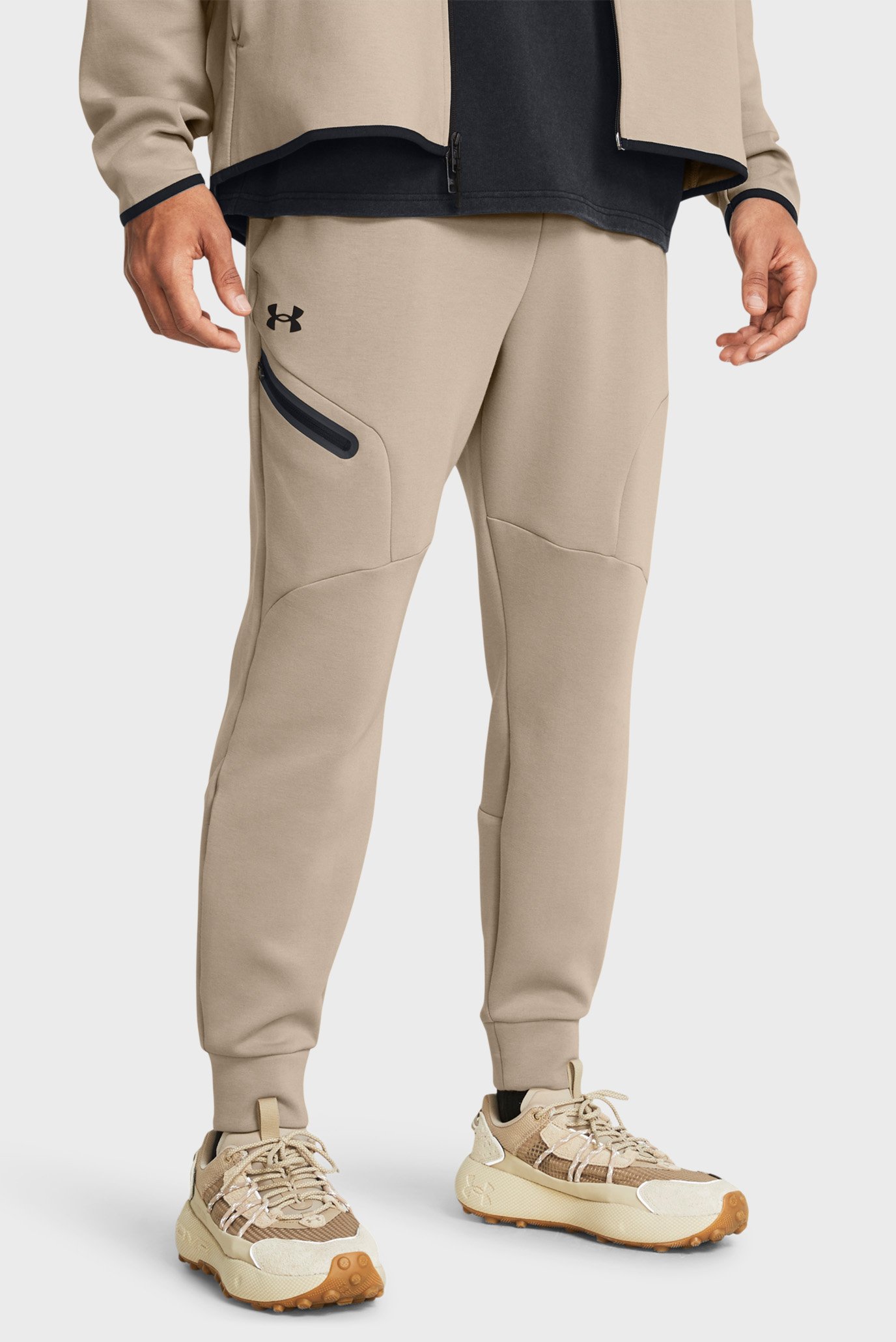 Чоловічі бежеві спортивні штани UA Unstoppable Flc Joggers 1
