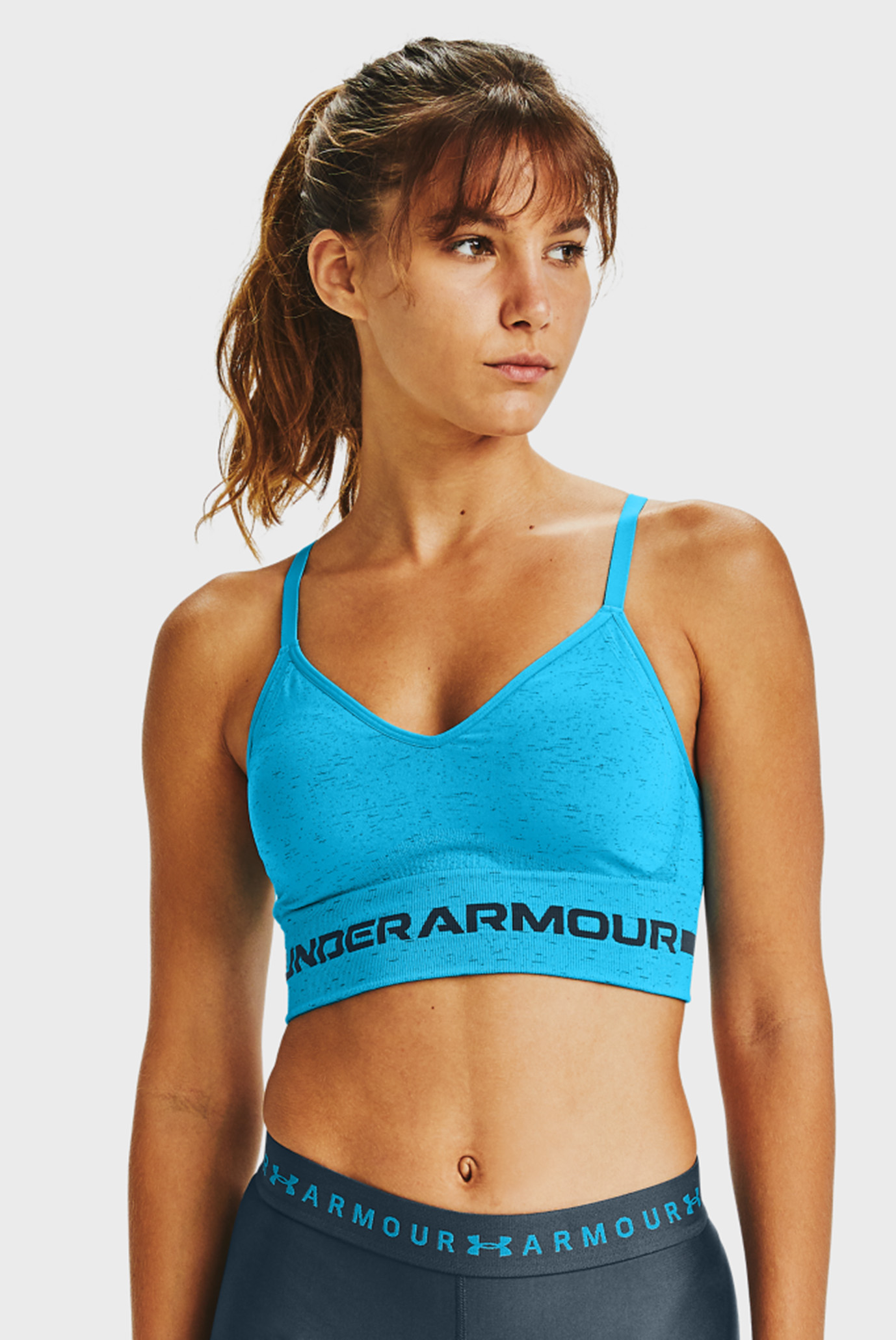 Женский голубой спортивный топ UA Seamless Low Long Htr Bra Under Armour  1357232-417 — MD-Fashion