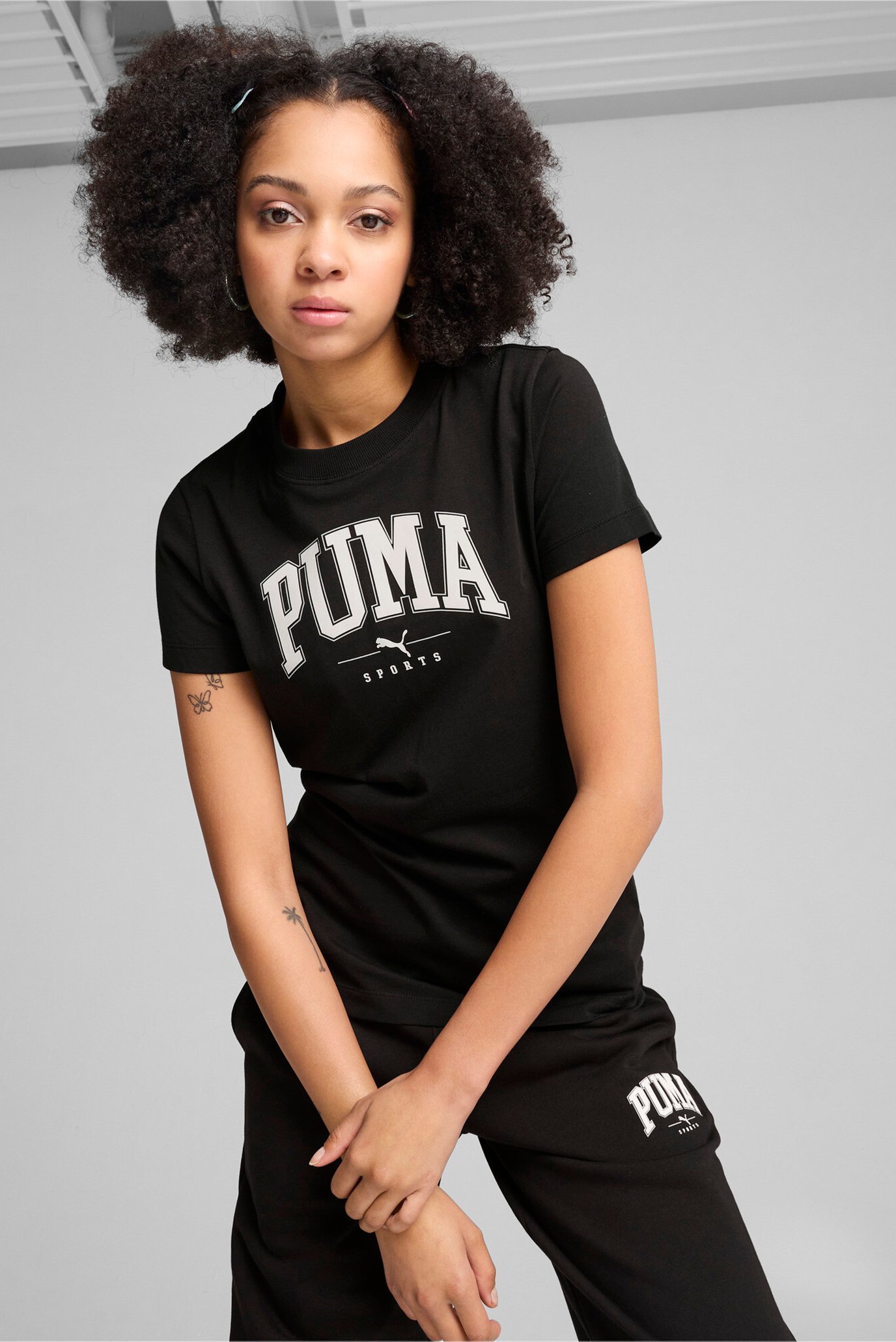 Женская черная футболка PUMA SQUAD Graphic Tee Women 1