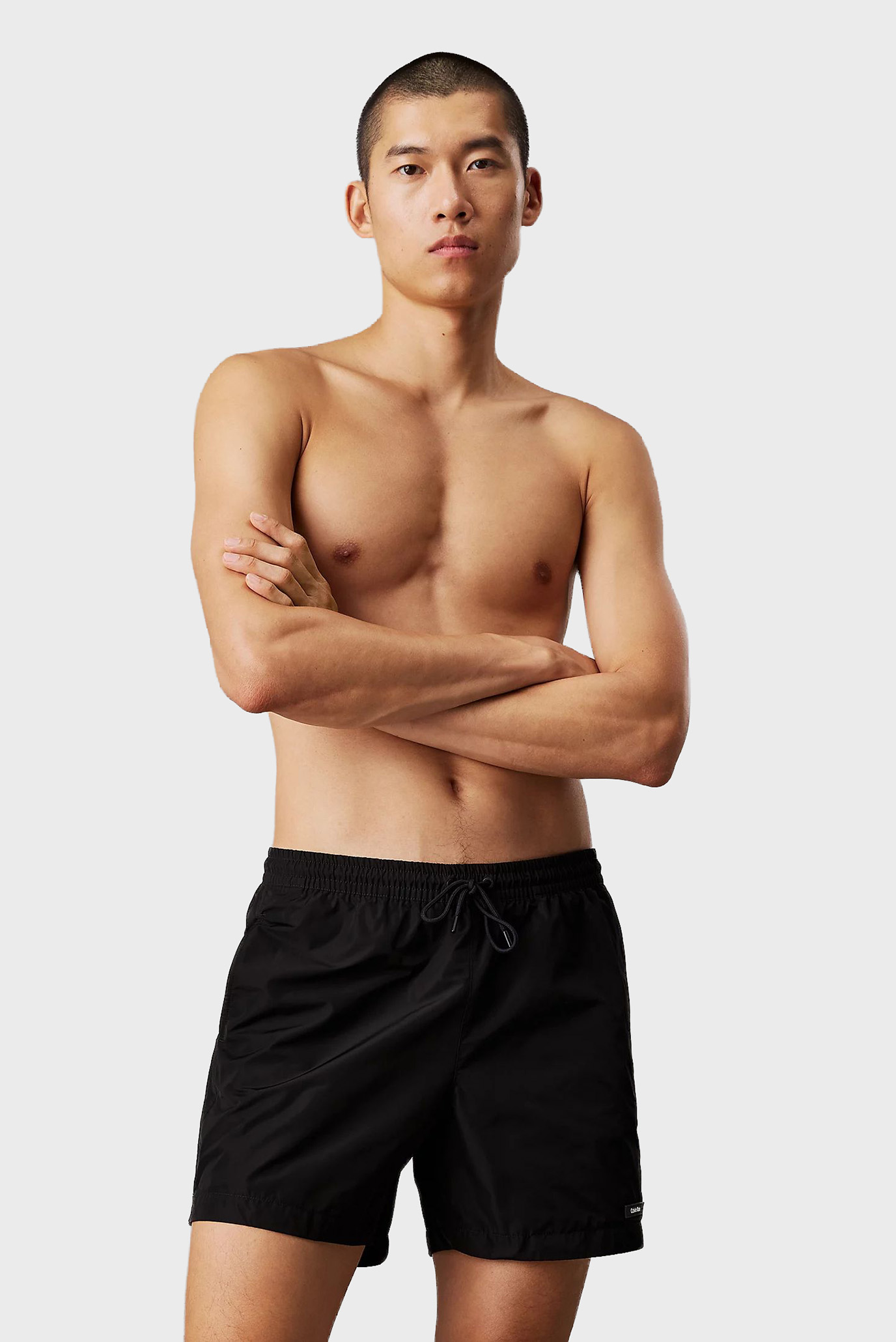 Мужские черные плавательные шорты MEDIUM DRAWSTRING Черный XL Calvin Klein KM0KM01111 Мужские черные плавательные шорты MEDIUM DRAWSTRING Черный XL Calvin Klein KM0KM01111