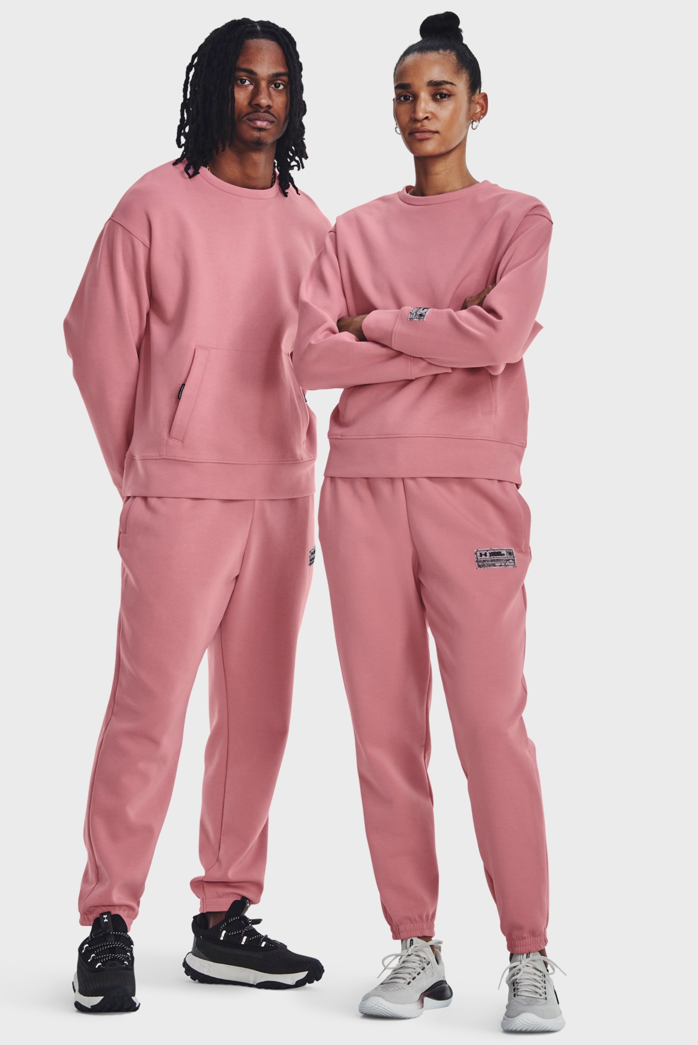Розовые спортивные брюки UA Summit Knit Joggers (унисекс) 1
