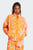 Жіноча помаранчева куртка adidas by Stella McCartney True Casuals Woven Printed
