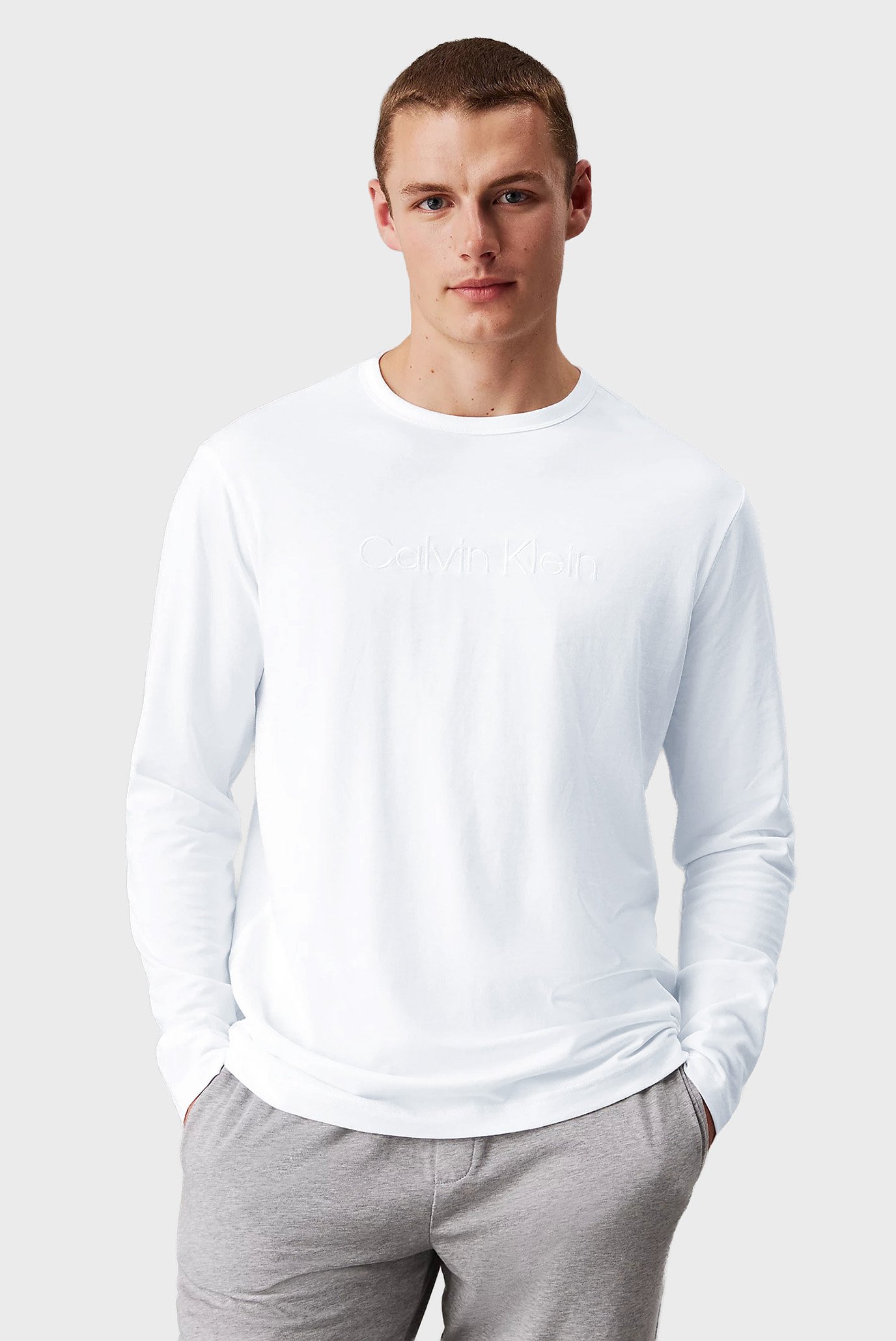 Мужской белый лонгслив CREW NECK Белый L Calvin Klein 000NM2771E Мужской белый лонгслив CREW NECK Белый L Calvin Klein 000NM2771E