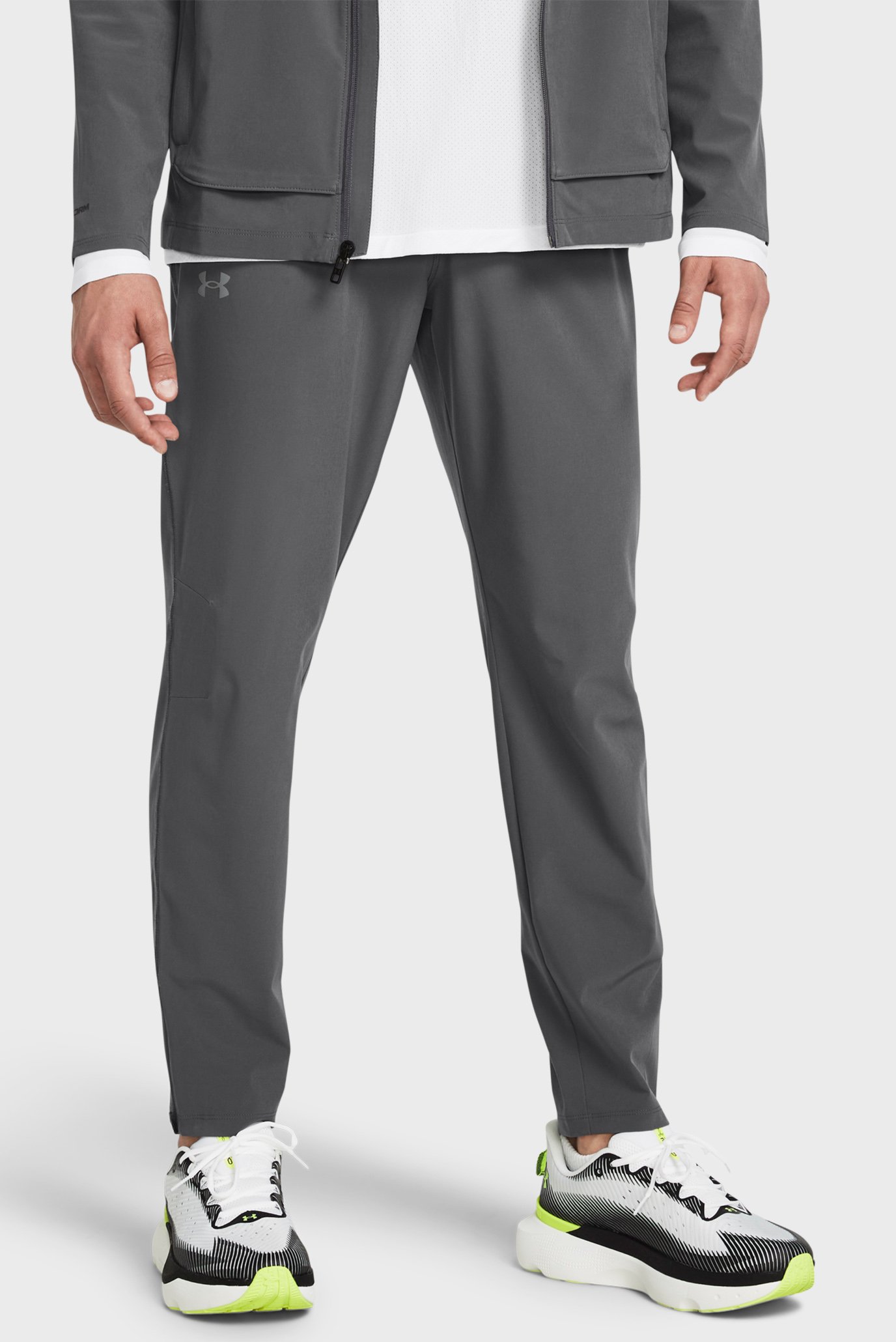 Чоловічі темно-сірі спортивні штани UA STORM RUN PANT 1