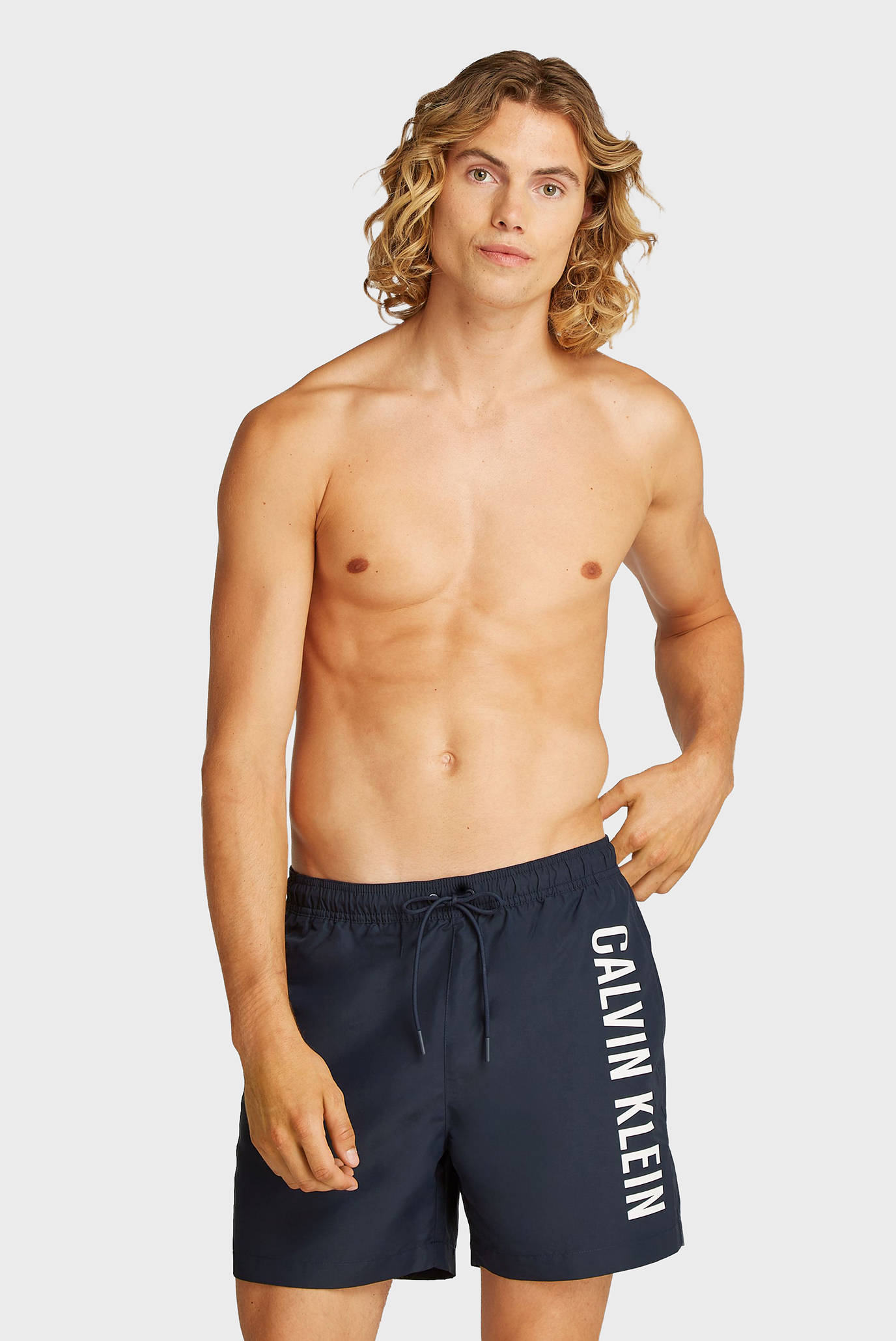 Мужские темно-синие плавательные шорты Синий M Calvin Klein KM0KM01092 Мужские темно-синие плавательные шорты Синий M Calvin Klein KM0KM01092