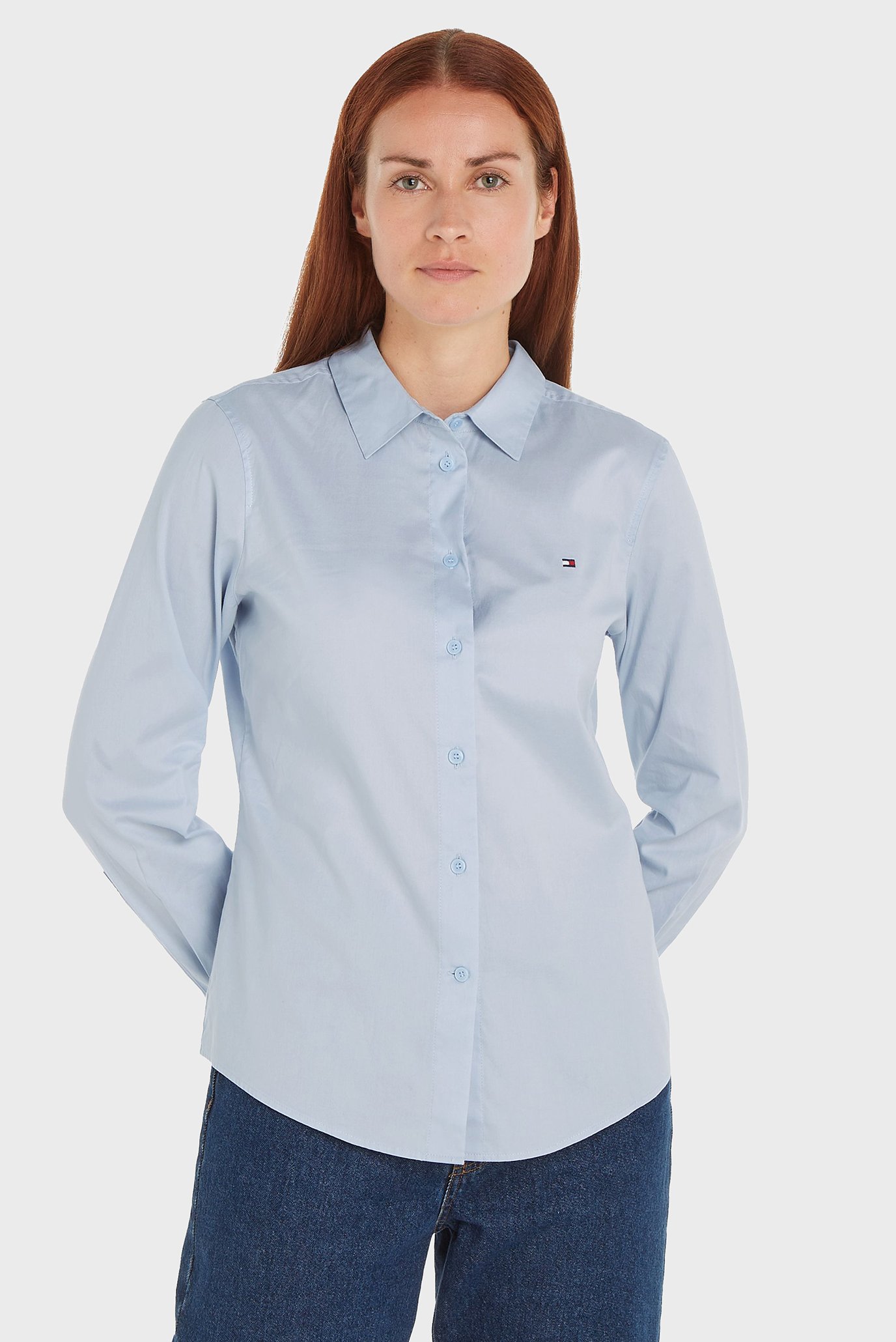 Женская голубая рубашка STRETCH OXFORD REGULAR SHIRT Голубой L Tommy Hilfiger WW0WW42019 Женская голубая рубашка STRETCH OXFORD REGULAR SHIRT Голубой L Tommy Hilfiger WW0WW42019