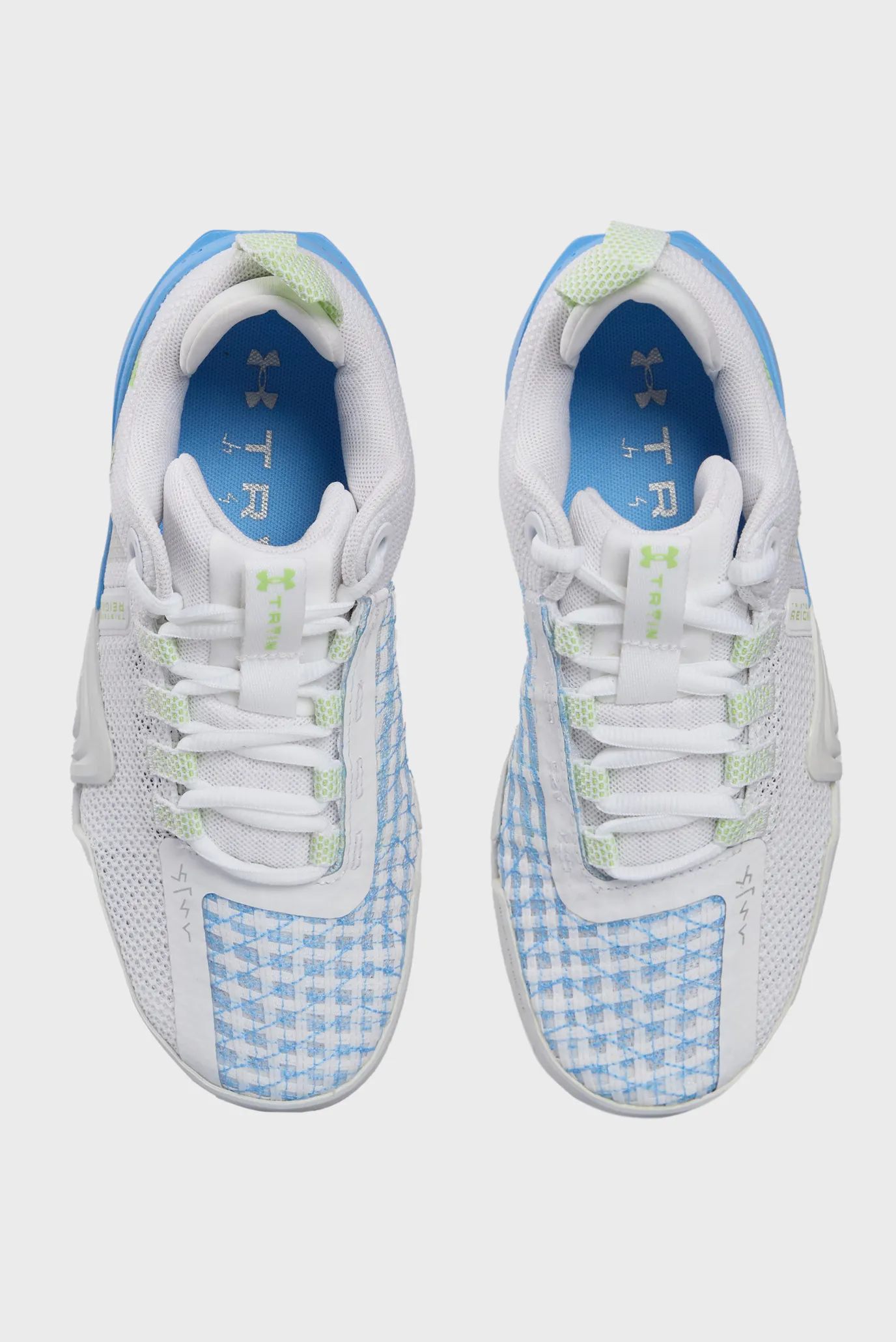 Жіночі білі кросівки UA W TriBase Reign 6 4