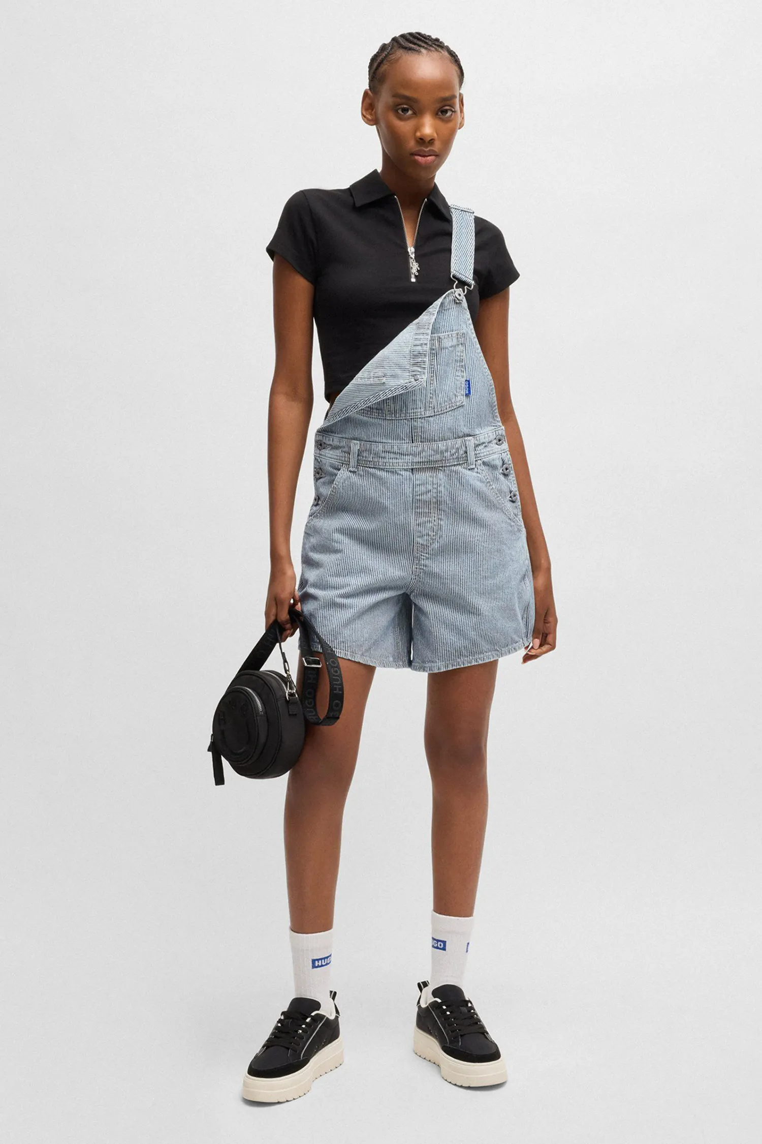 Жіночий блакитний джинсовий комбінезон у смужку 2