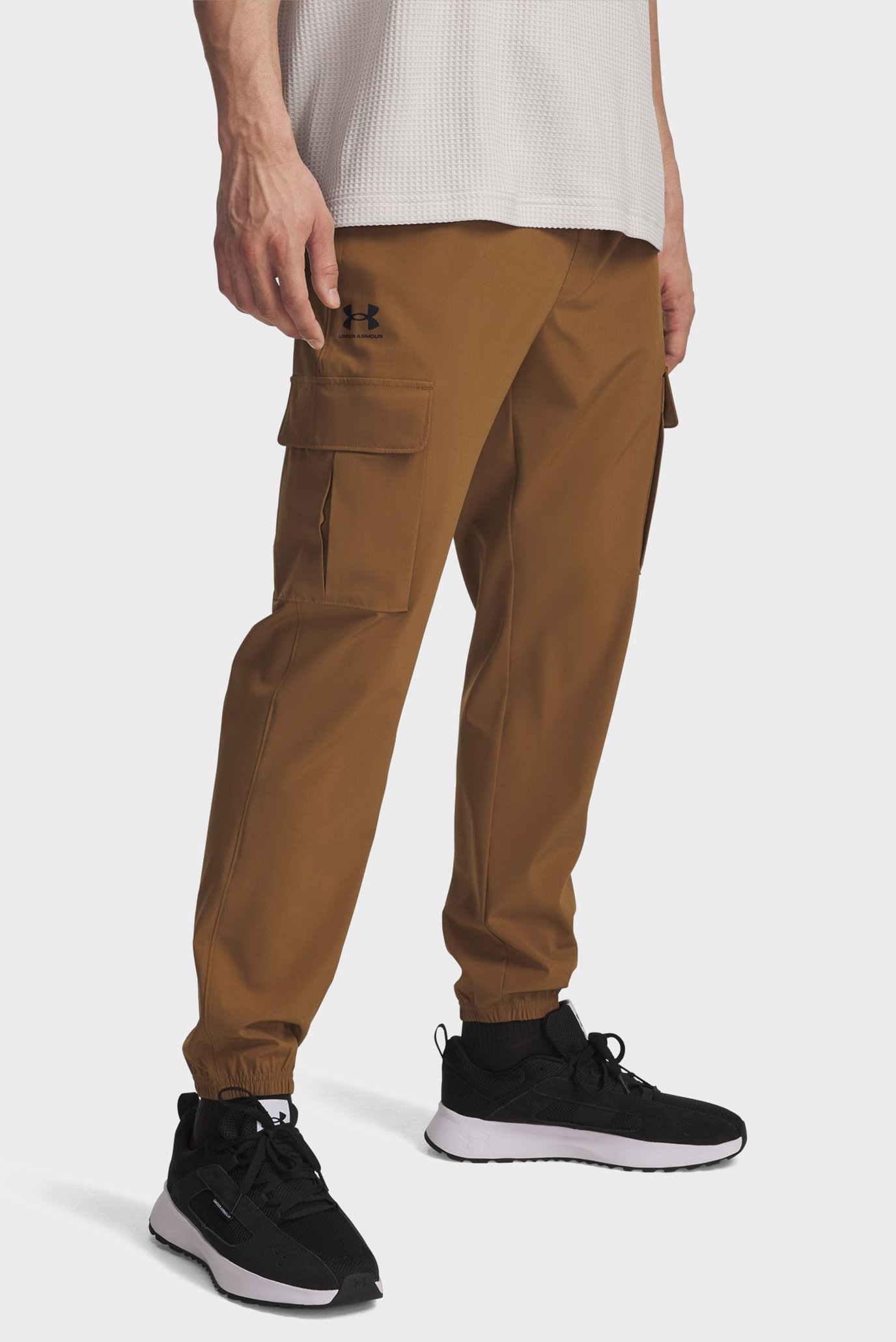 Мужские коричневые спортивные брюки UA Vibe Woven Cargo Pants Коричневый S Under Armour 1386558-498 Мужские коричневые спортивные брюки UA Vibe Woven Cargo Pants Коричневый S Under Armour 1386558-498