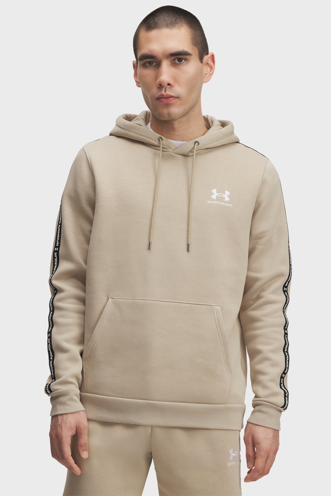 Мужское бежевое худи UA Icon Fleece HD Taping Бежевый XL Under Armour 1389356-299 Мужское бежевое худи UA Icon Fleece HD Taping Бежевый XL Under Armour 1389356-299