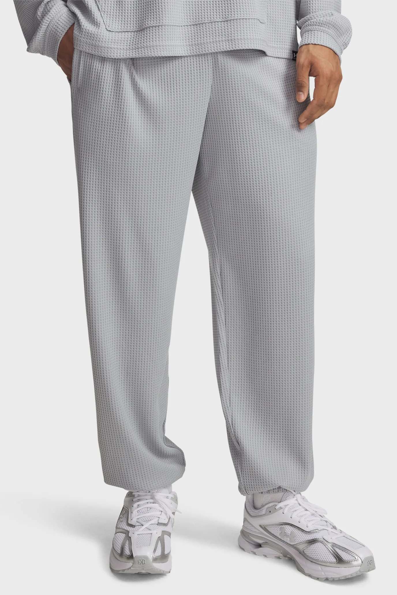 Чоловічі сірі спортивні штани UA Rival Waffle Jogger 1