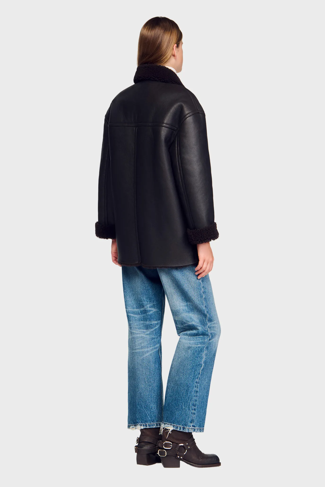 Женская темно-коричневая кожаная дубленка 3