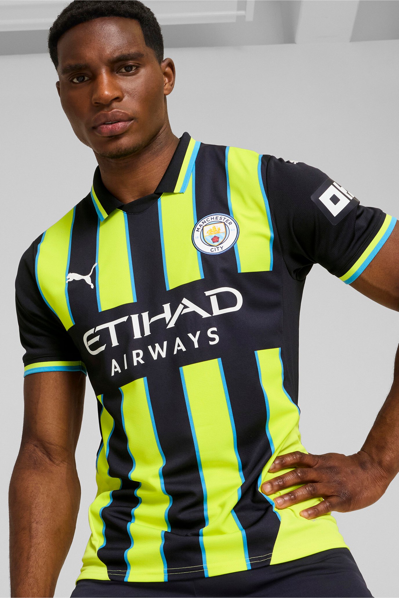 Чоловіче чорне поло у смужку Manchester City 24/25 Away Jersey Men 1