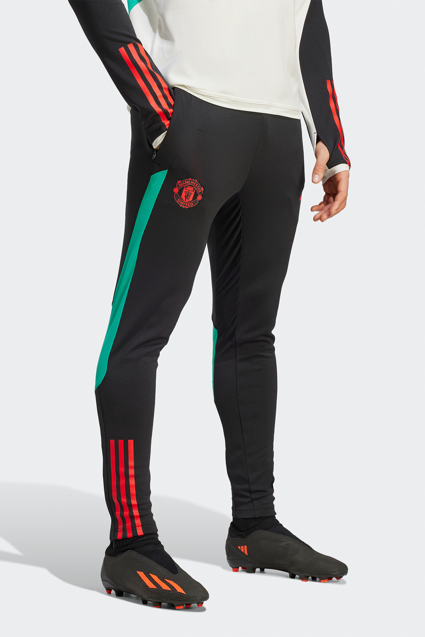 Мужские черные спортивные брюки Manchester United Tiro 23 Training 1