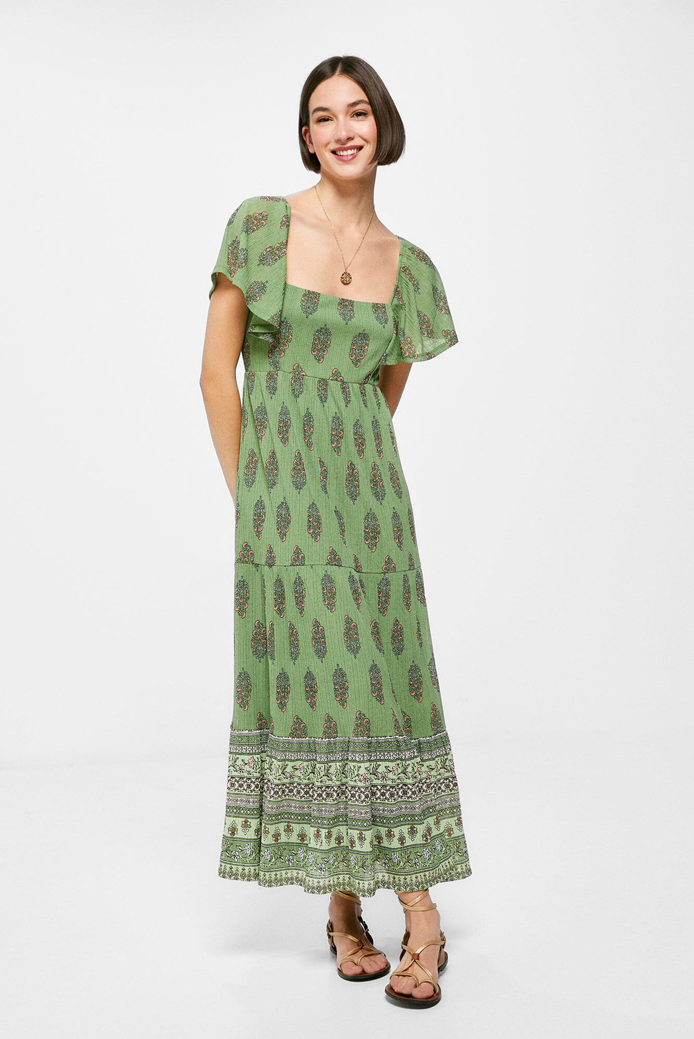 Женское зеленое платье с узором 1