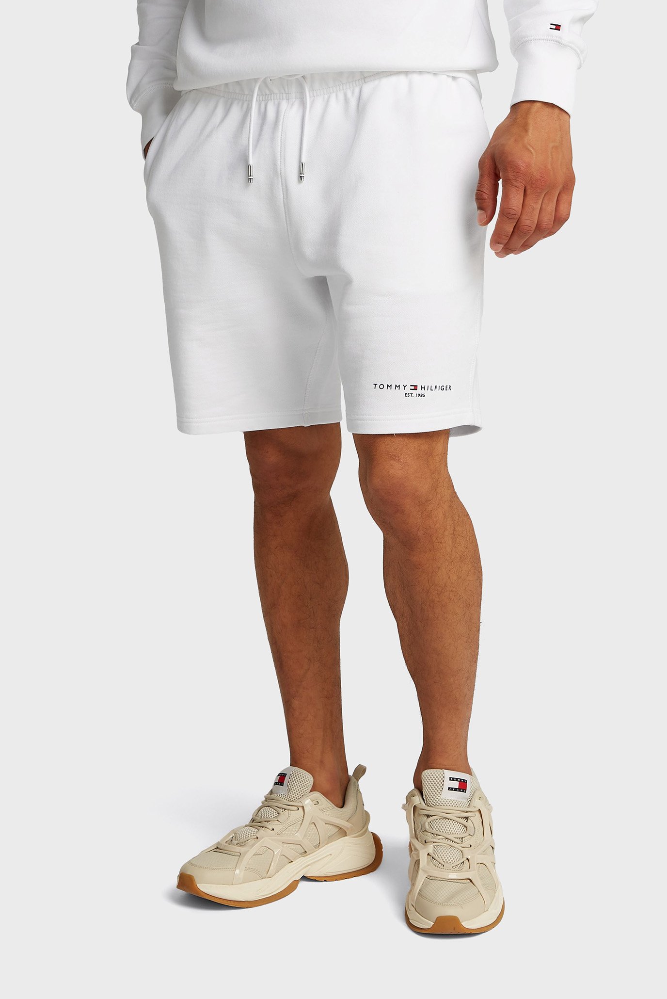 Мужские белые шорты SMALL TOMMY LOGO SWEATSHORTS Белый XXL Tommy Hilfiger MW0MW38698 Мужские белые шорты SMALL TOMMY LOGO SWEATSHORTS Белый XXL Tommy Hilfiger MW0MW38698