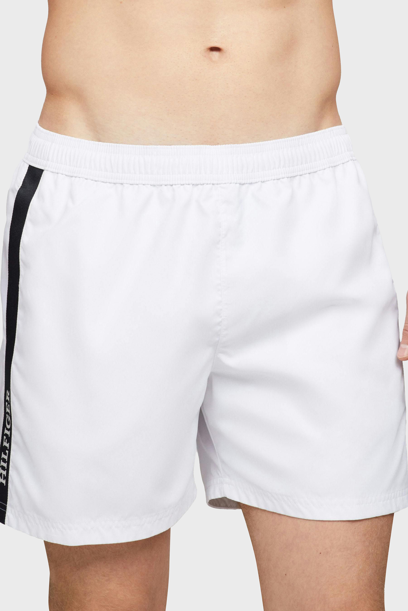 Мужские белые плавательные шорты MEDIUM DRAWSTRING TAPE Белый S Tommy Hilfiger UM0UM03213 Мужские белые плавательные шорты MEDIUM DRAWSTRING TAPE Белый S Tommy Hilfiger UM0UM03213