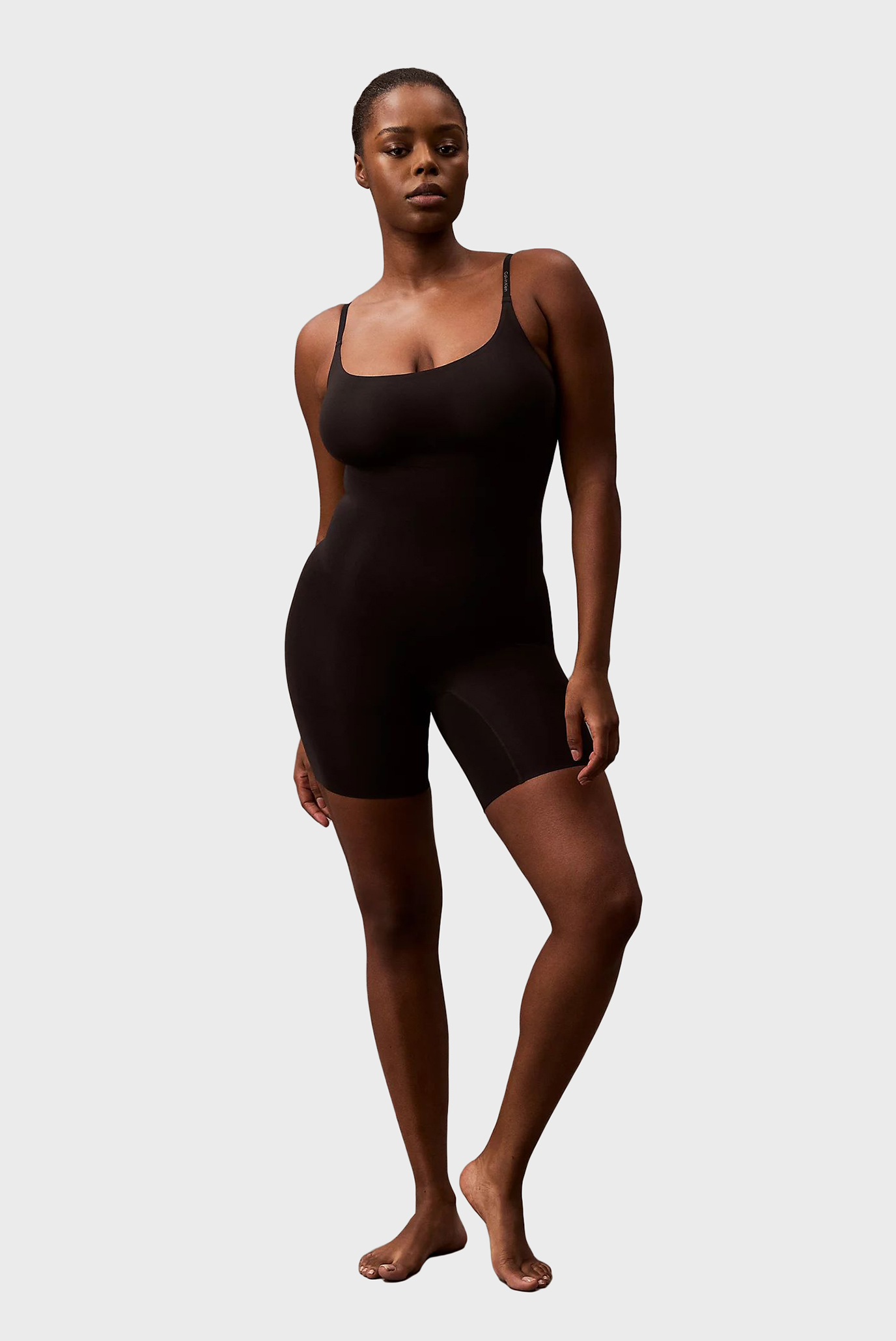 Женский черный моделирующий комбинезон MID THIGH BODYSUIT Черный L Calvin Klein LV00QF8164 Женский черный моделирующий комбинезон MID THIGH BODYSUIT Черный L Calvin Klein LV00QF8164