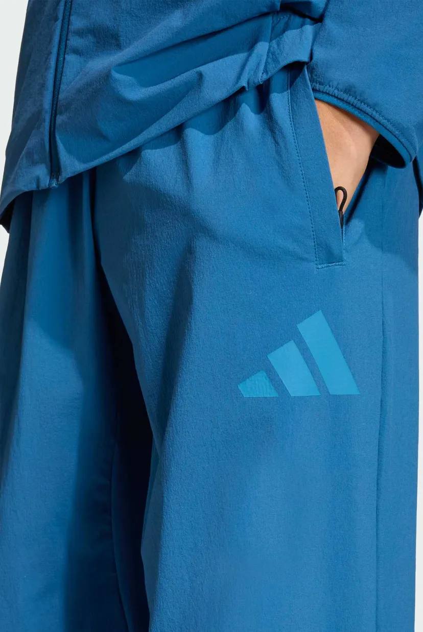 Детские синие спортивные брюки Z.N.E. Woven Travel 6
