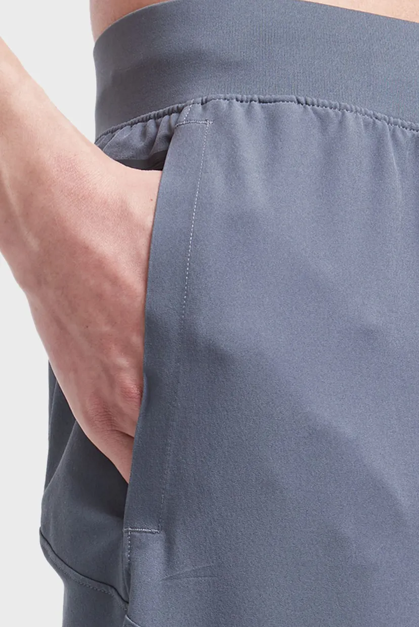 Чоловічі сірі спортивні штани UA UNSTOPPABLE TAPERED 4