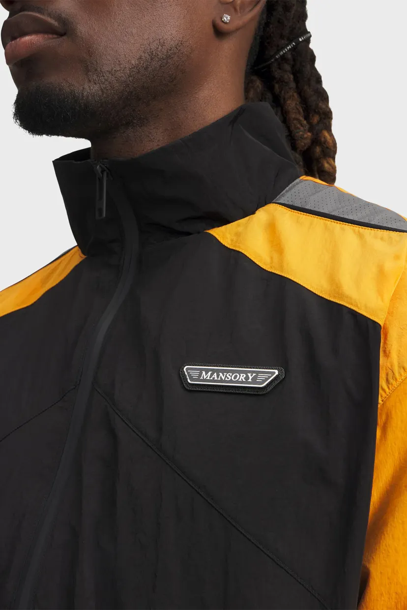 Чоловіча чорна вітровка UA x Mansory Icon Track Jkt 3