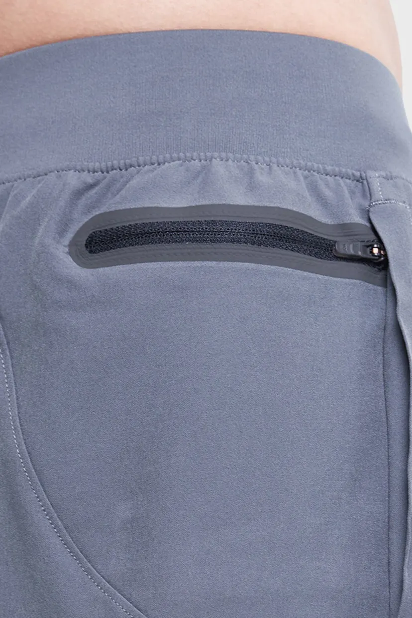 Мужские серые спортивные брюки UA UNSTOPPABLE TAPERED 5