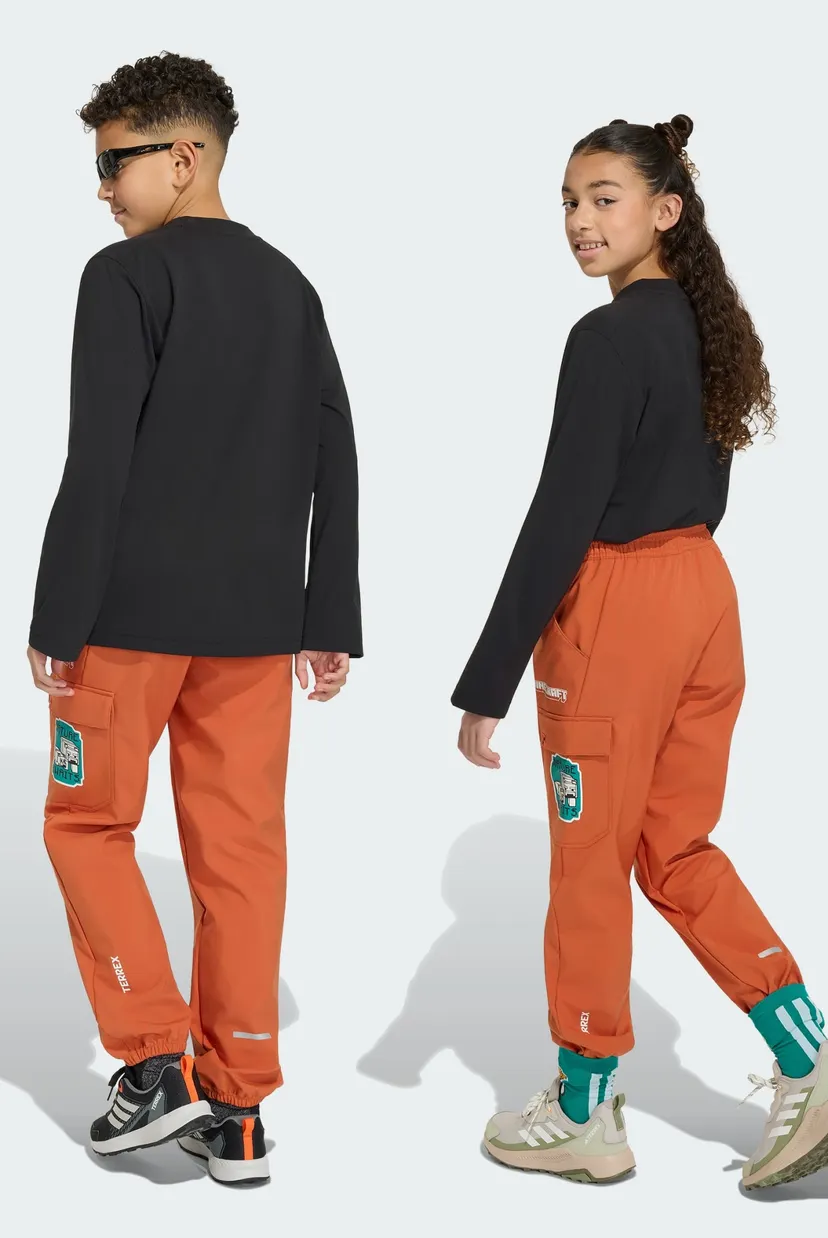 Дитячі помаранчеві спортивні штани Adidas Minecraft Terrex CLIMAWARM Softshell 3