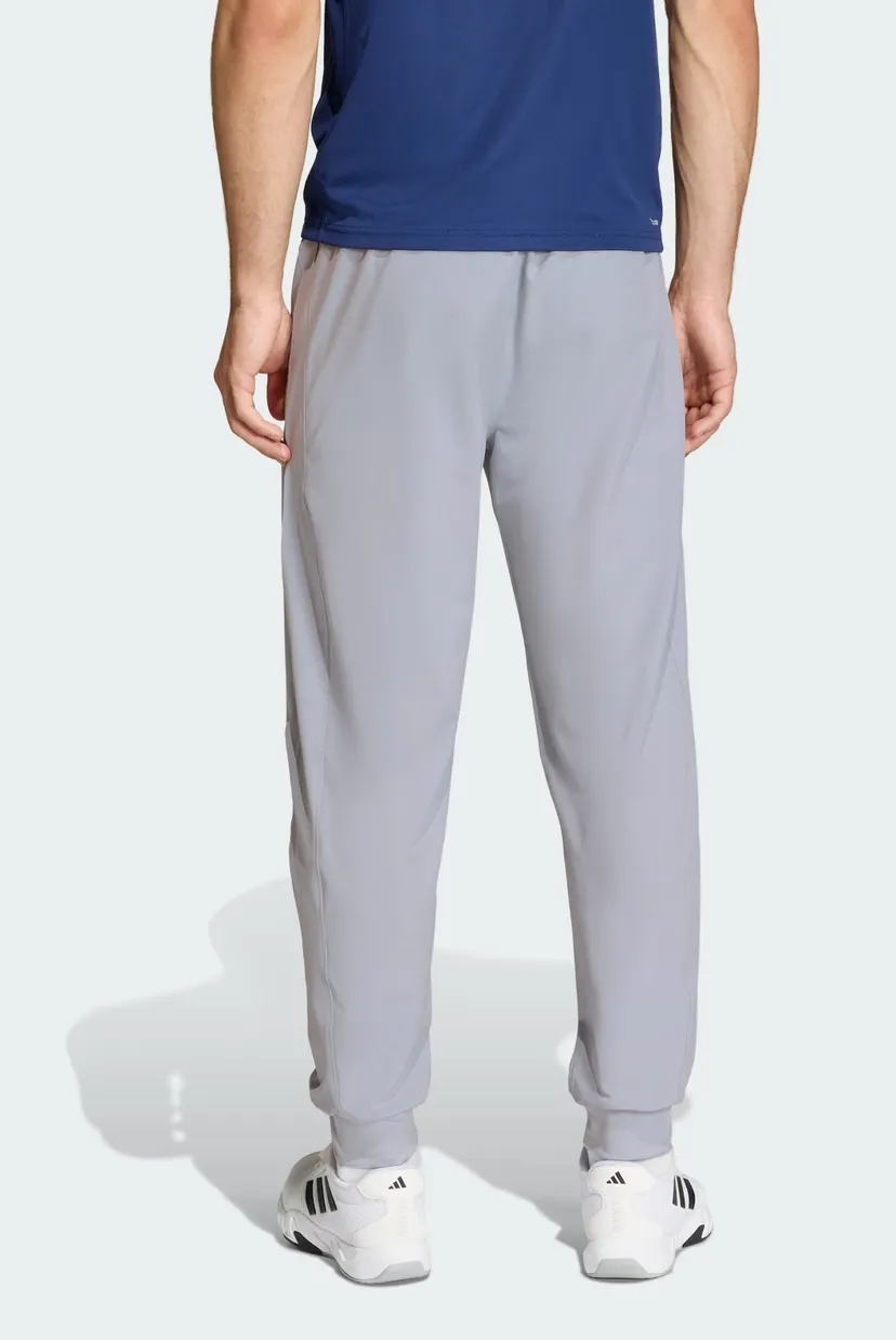 Чоловічі сірі спортивні штани WORKOUT ESSENTIALS FLEX WOVEN 3