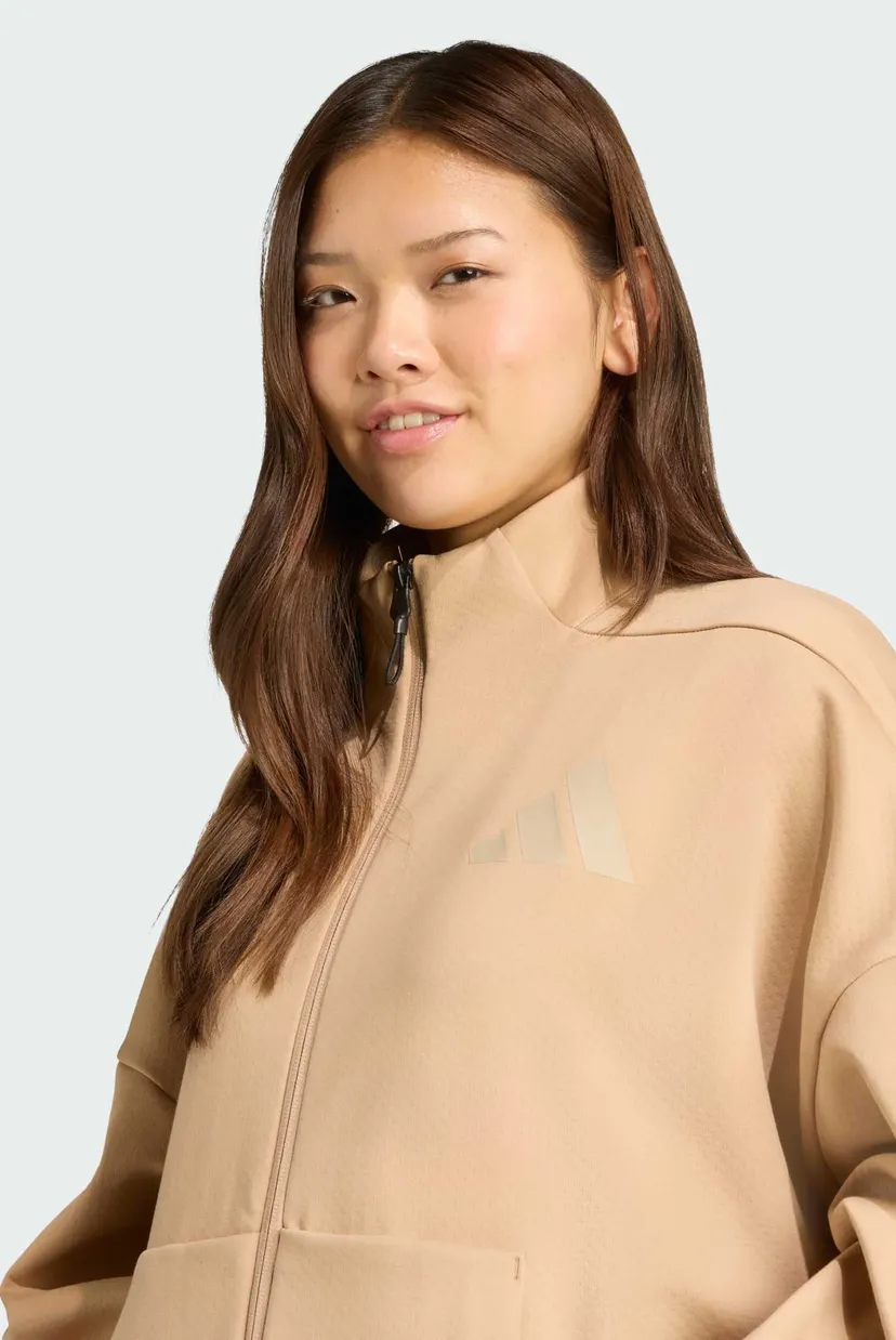 Жіноча бежева спортивна кофта adidas Z.N.E. 4