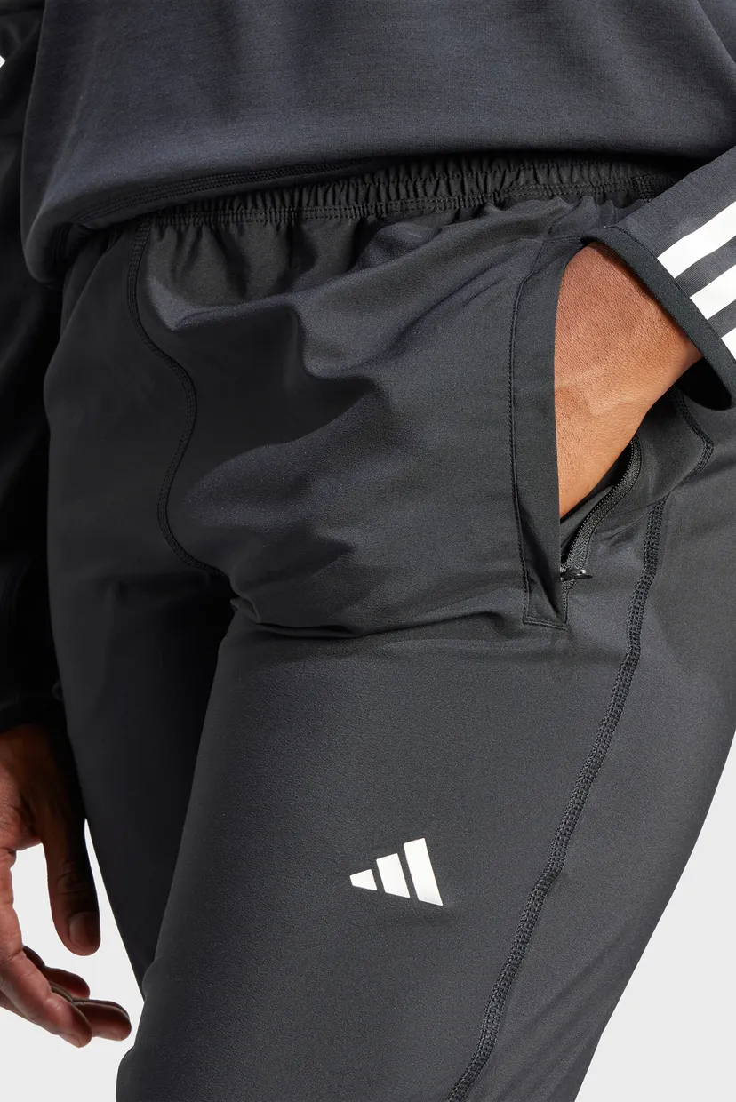 Женские черные спортивные брюки Own the Run 4