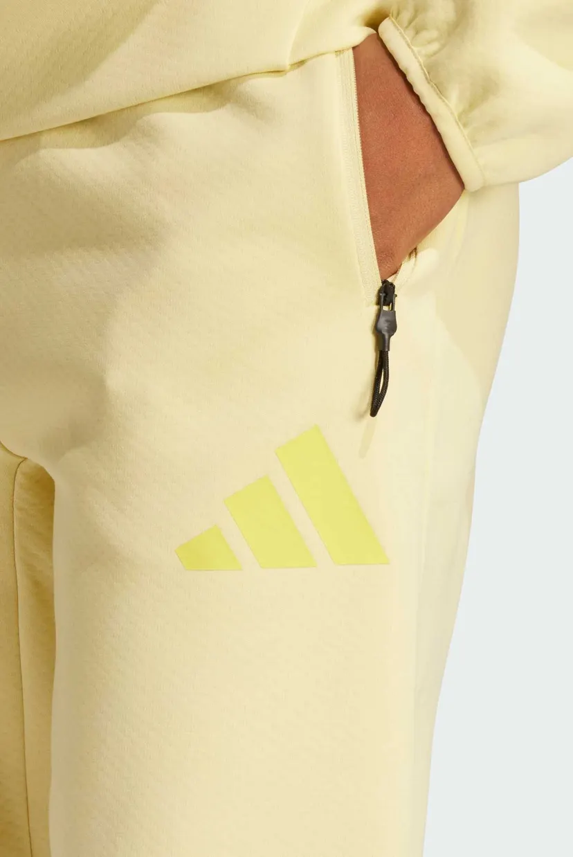 Женские желтые спортивные брюки adidas Z.N.E. 4