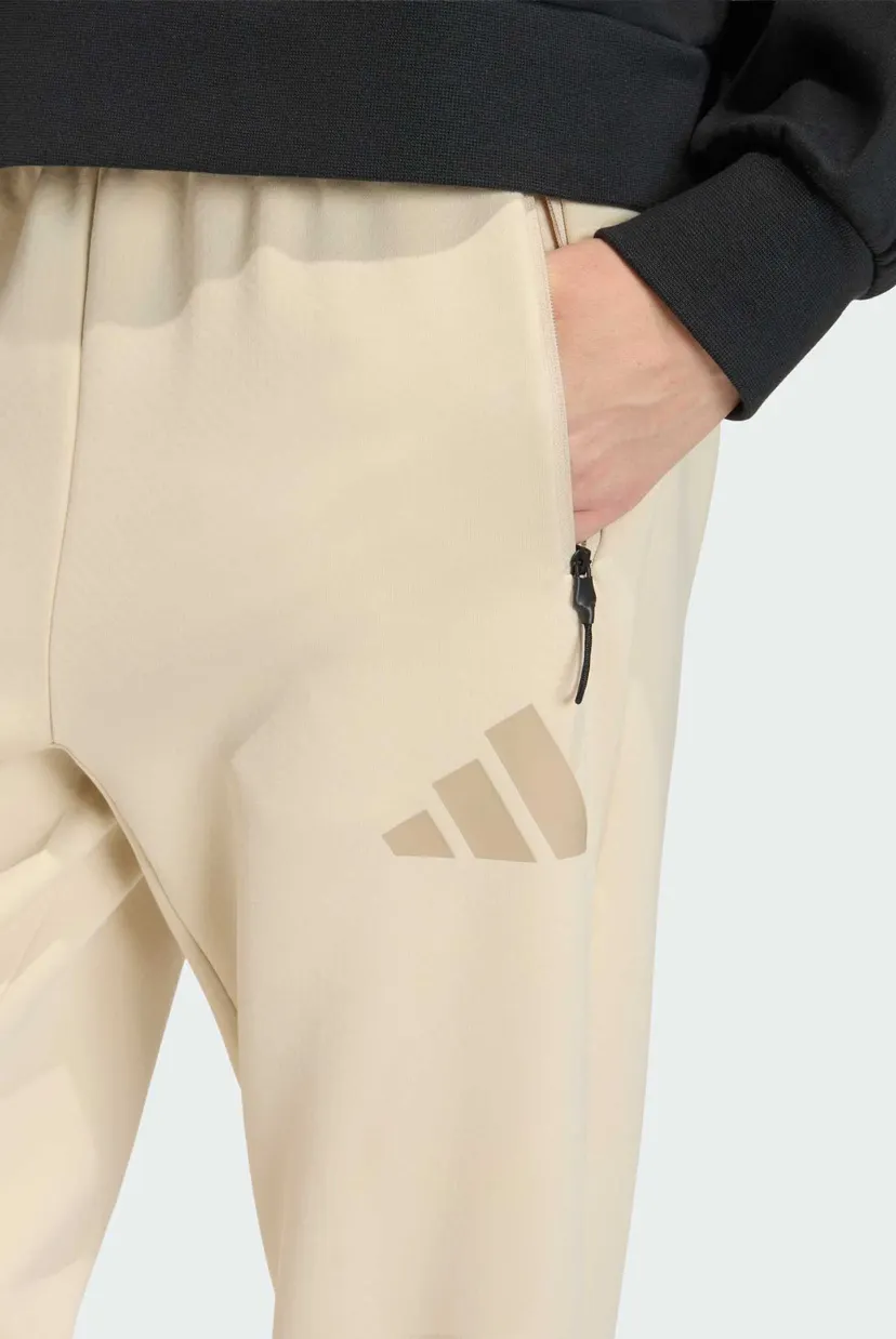 Женские бежевые спортивные брюки adidas Z.N.E. 4