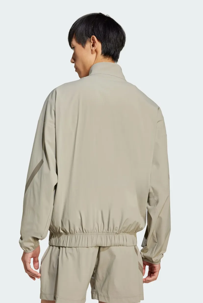Мужская бежевая спортивная кофта adidas Z.N.E. Woven adidas JN9028