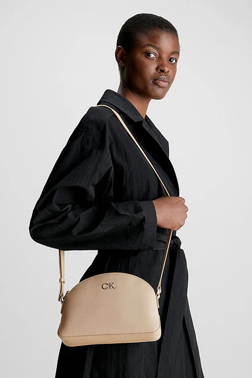 Жіноча бежева сумка RE-LOCK SEASONAL CROSSBODY MD 7