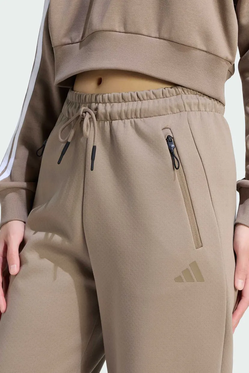 Жіночі бежеві спортивні штани ADIDAS Z.N.E. 4