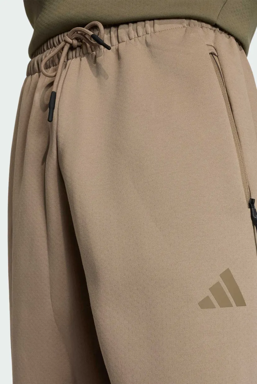 Чоловічі бежеві спортивні штани ADIDAS Z.N.E. 4