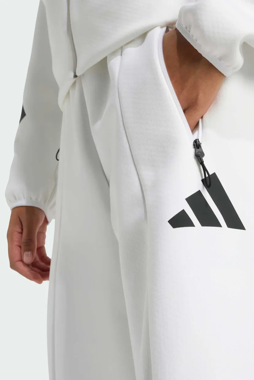 Женские белые спортивные брюки adidas Z.N.E. Open-Hem 4