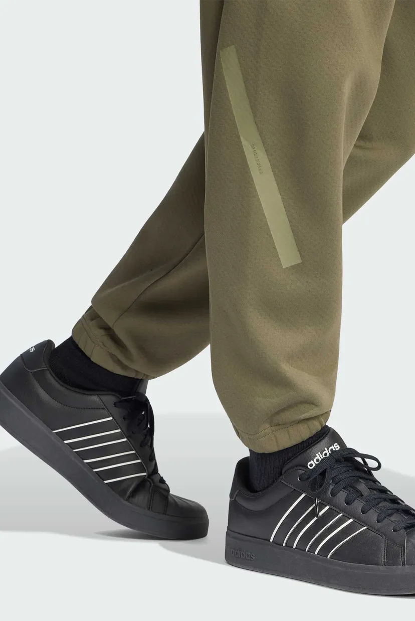 Мужские оливоковые спортивние брюки ADIDAS Z.N.E. 4
