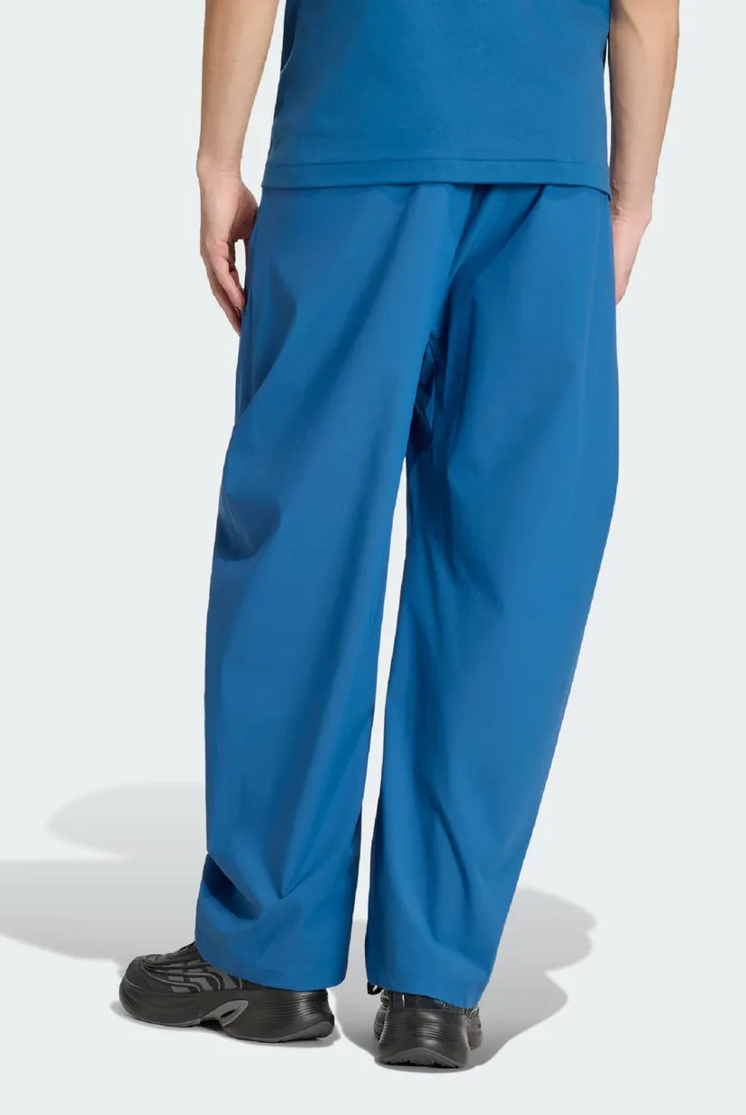 Мужские синие спортивные брюки ADIDAS Z.N.E. WOVEN 3
