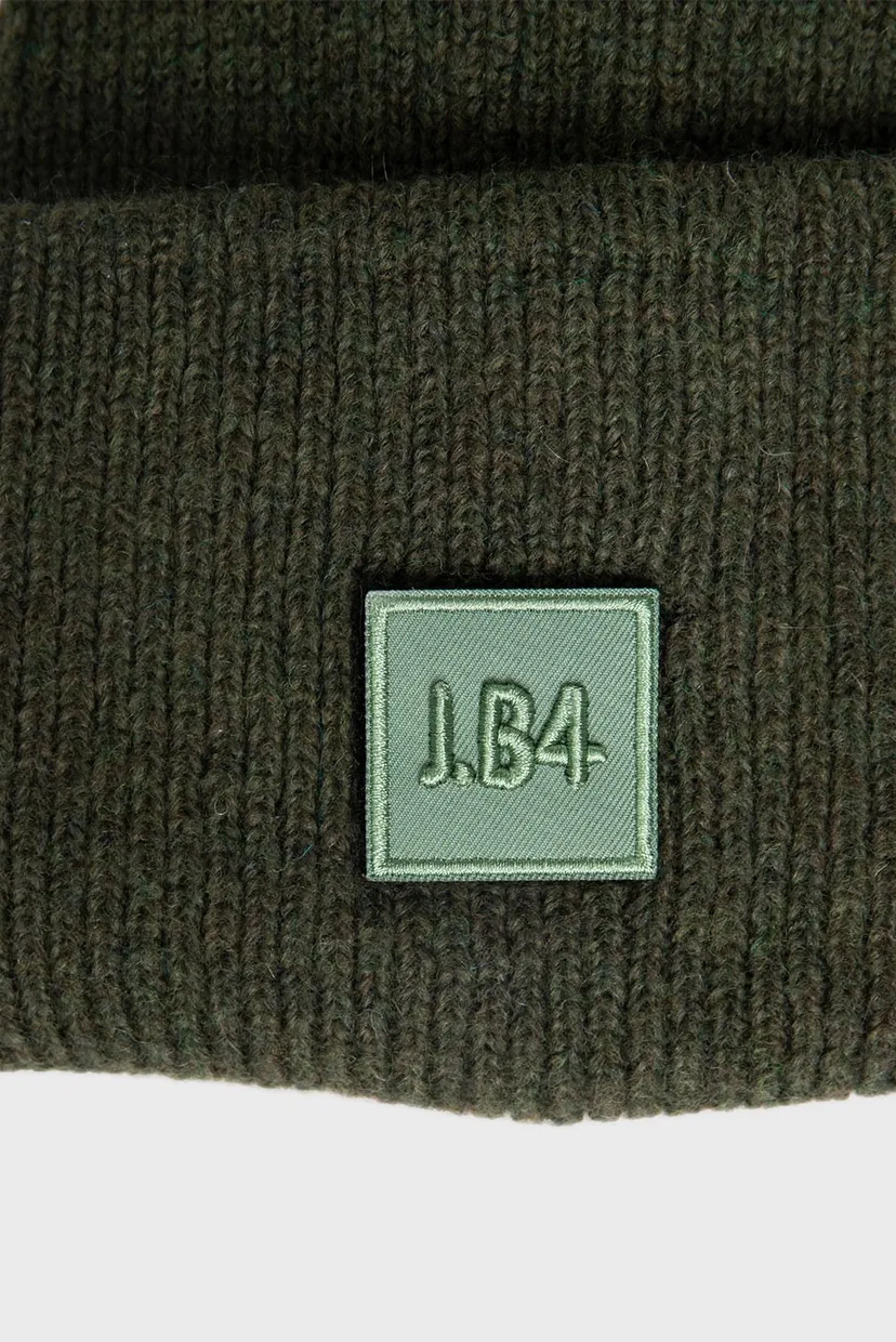 Жіноча зелена вовняна шапка 3